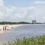Beachgoers at Ken Combs Pier in Gulfport, MS