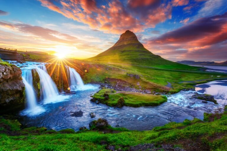 Gorgeous landscape with rising sun on Kirkjufellsfoss waterfall