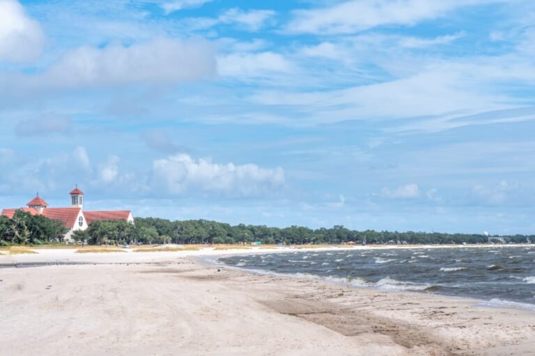 Calm white-sand beach in Long Beach, MS
