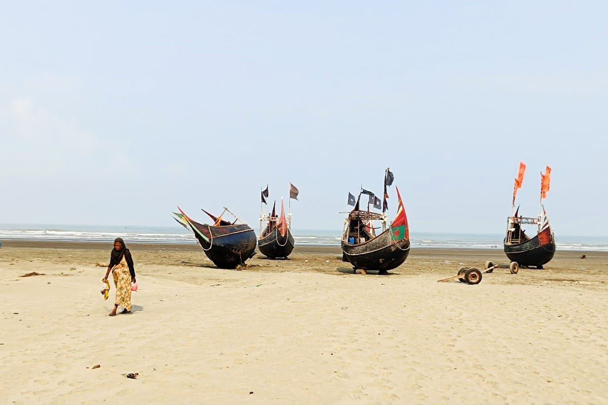 Woman in traditional garb on Bangladesh beach