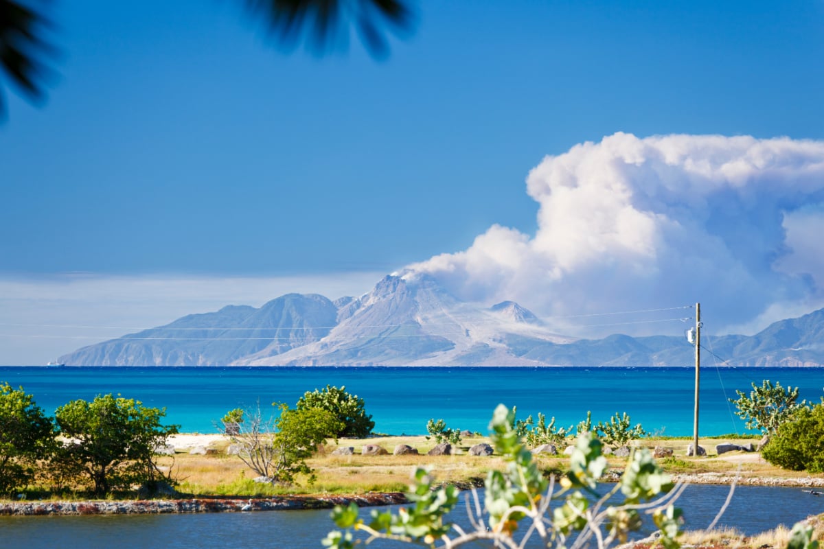 View to the active volcano in Montserrat with a large ash cloud.